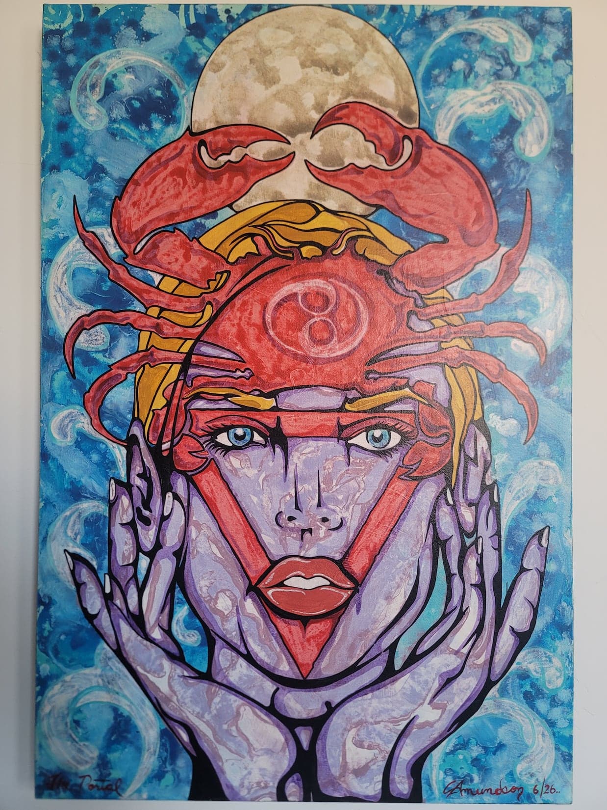 A face held in two open hands beneath a full moon, crowned by a large red crab, against swirling blue water.